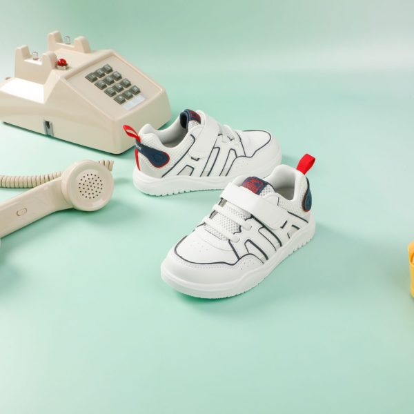 White sneakers with navy and red accents